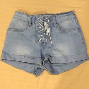 High rise, super stretch light denim shorts